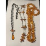 THREE VINTAGE POSSIBLY AMBER NECKLACES