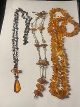 THREE VINTAGE POSSIBLY AMBER NECKLACES