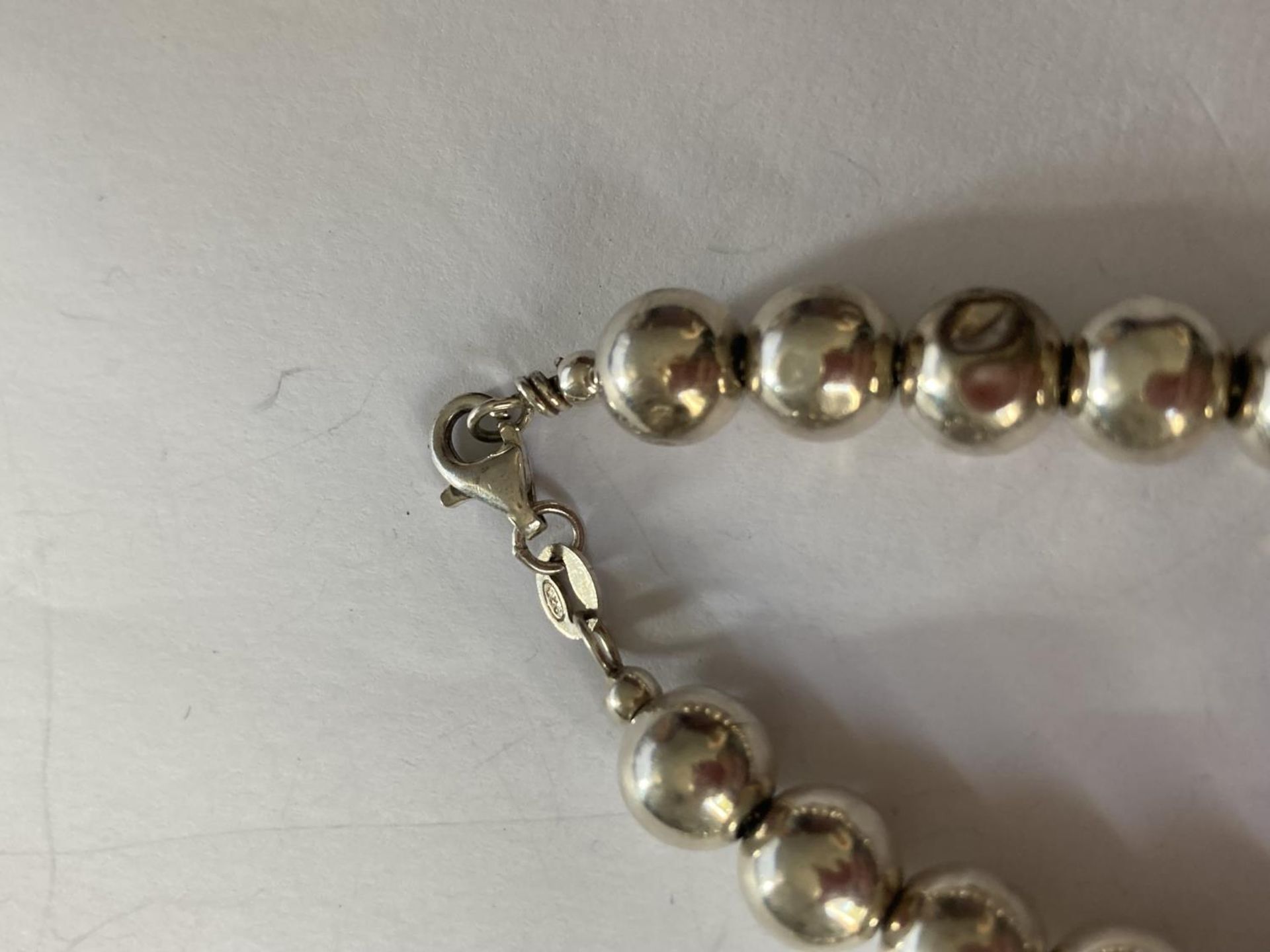 TWO SILVER BRACELETS (BEADS NOT SILVER ONLY THE CHAIN) - Image 3 of 3