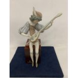 A LLADRO FIGURE OF SEATED MINSTREL PLAYING A LUTE (THUMB A/F)