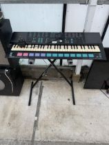 A YAMAHA PSS-780 ELECTRIC KEYBOARD AND STAND