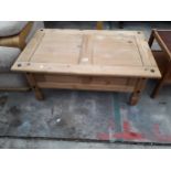 A MEXICAN PINE COFFEE TABLE WITH SINGLE DRAWERS, 39 X 24"