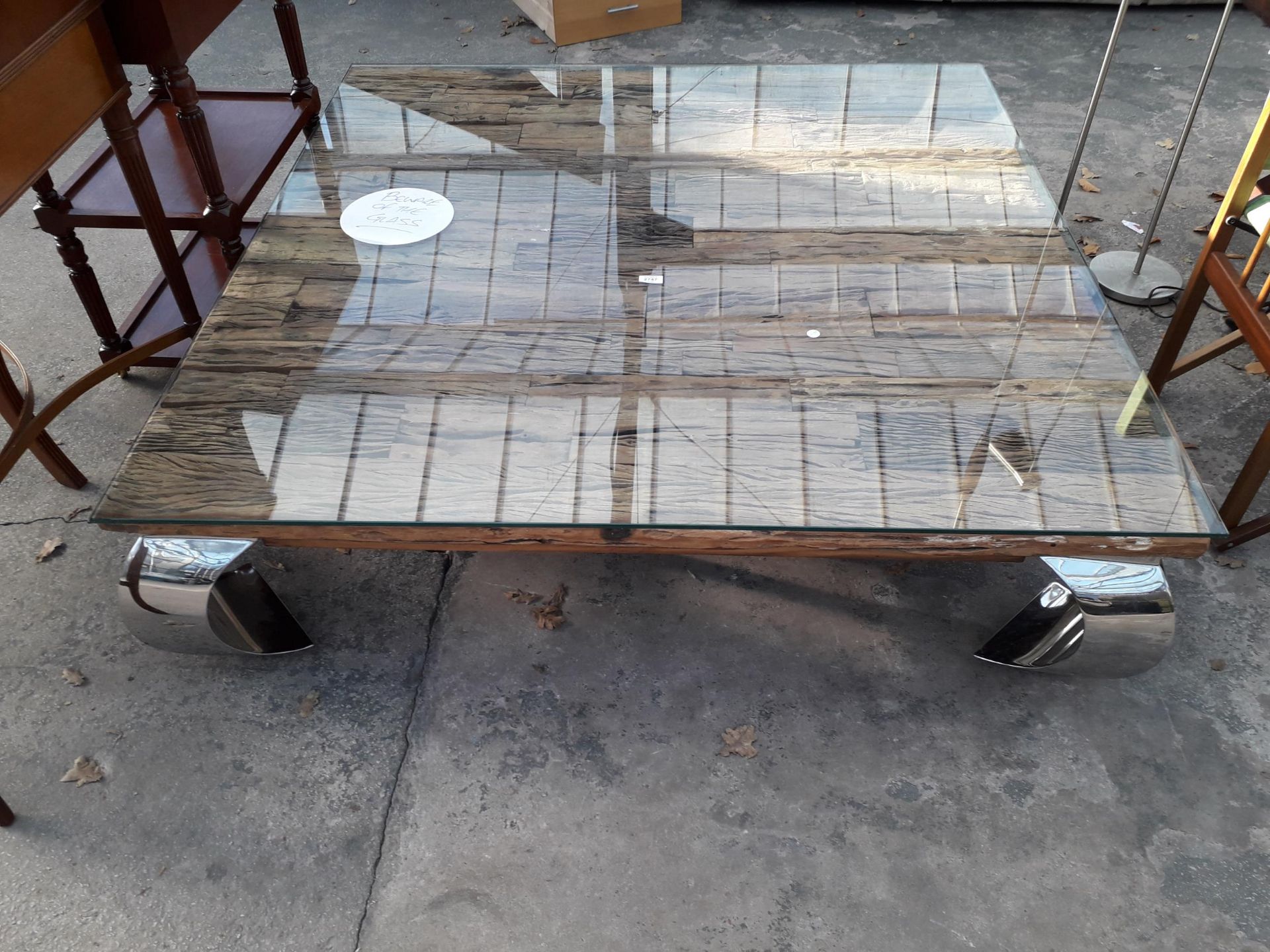 A RUSTIC COFFEE TABLE WITH RECLAIMED WOOD TOP ON SWEPT CHROMIUM PLATED LEGS, 55" SQUARE