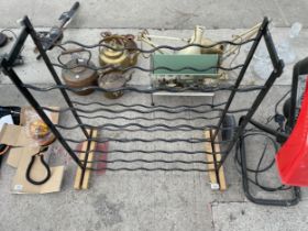 A DECORATIVE METAL 49 BOTTLE WINE RACK