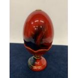 A ROYAL DOULTON LIMITED EDITION FLAMBE VEINED EGG AND STAND NO. 2264