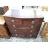 A 19TH CENTURY MAHOGANY BOWFRONTED CHEST OF TWO SHORT AND THREE LONG GRADUATED DRAWERS, 40" WIDE
