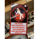 A GREASE MONKEY GARAGE SIGN