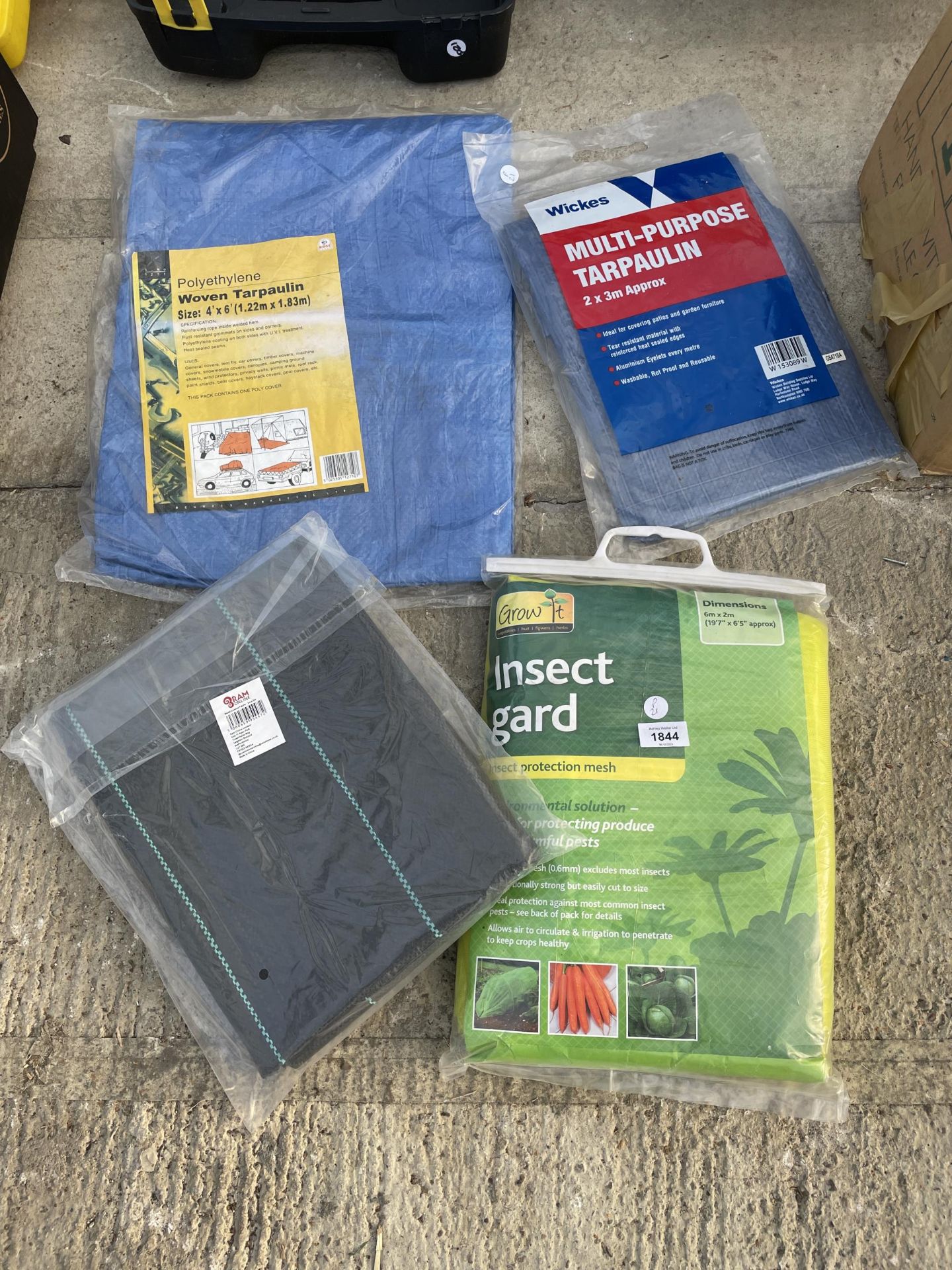 THREE NEW AND PACKAGED TARPUALIN SHEETS AND AN INSECT GUARD