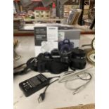AN OLYMPUS E-450 DIGITAL CAMERA WITH LENS, BATTERY CHARGER, ORIGINAL BOX AND INSTRUCTIONS