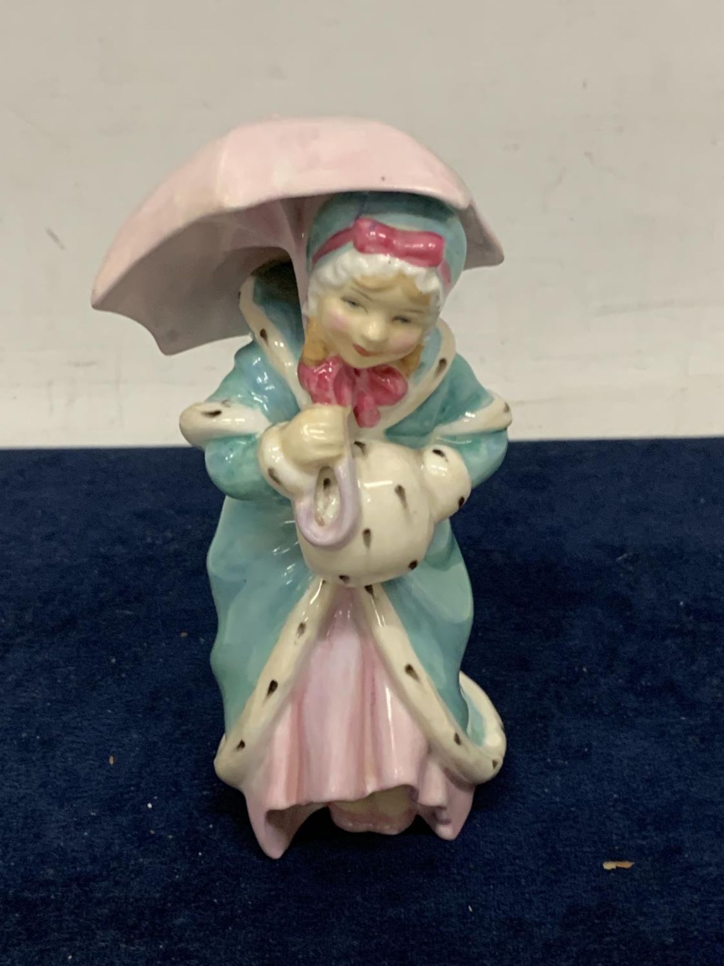 A ROYAL DOULTON MISS MUFFETT FIGURE HN1937