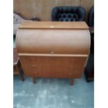 A RETRO TEAK CYLINDER BUREAU WITH THREE DRAWERS TO THE BASE, 35.5" WIDE