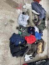 A LARGE ASSORTMENT OF CLOTHING TO INCLUDE SHOES, AND BAGS