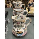 A SET OF THREE MASONS IRONSTONE HYDRA JUGS