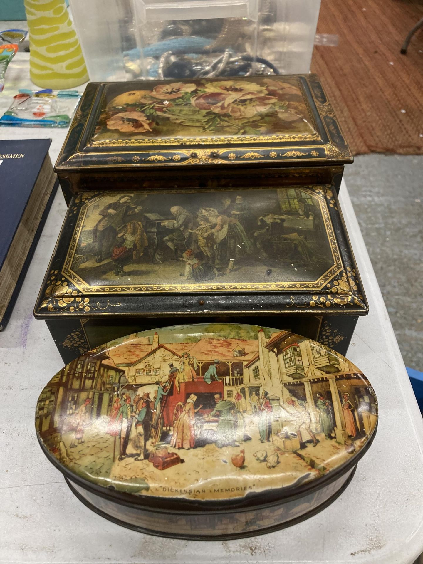 A GROUP OF THREE TIN STORAGE BOXES