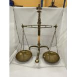 A PAIR OF VINTAGE BRASS BALANCE SCALES