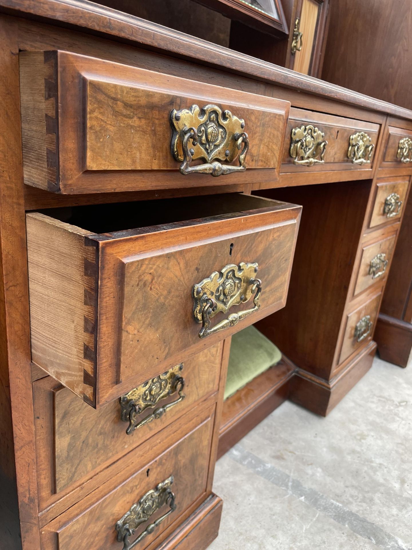 A VICTORIAN WALNUT KNEEHOLE DRESSING TABLE ENCLOSING NINE DRAWERS, TWO GLAZED CUPBOARDS AND - Image 4 of 5