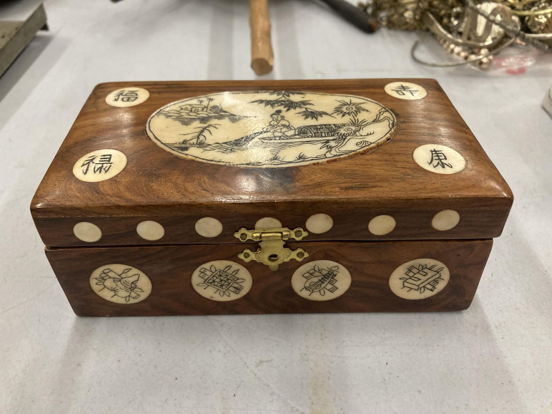 AN ORIENTAL INLAID BOX