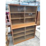 TWO RETRO TEAK BOOKCASES WITH GLASS SLIDING DOORS, 49" WIDE EACH