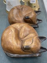 TWO SOLID WOODEN SLEEPING CAT DOORSTOPS