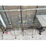 A PAIR OF STEEL PLANT CLIMBING FRAMES AND A STEEL BIRD FEEDER STAND