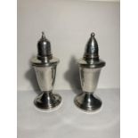 A PAIR OF MARKED CROWN STERLING SILVER CRUETS WITH GLASS LINERS