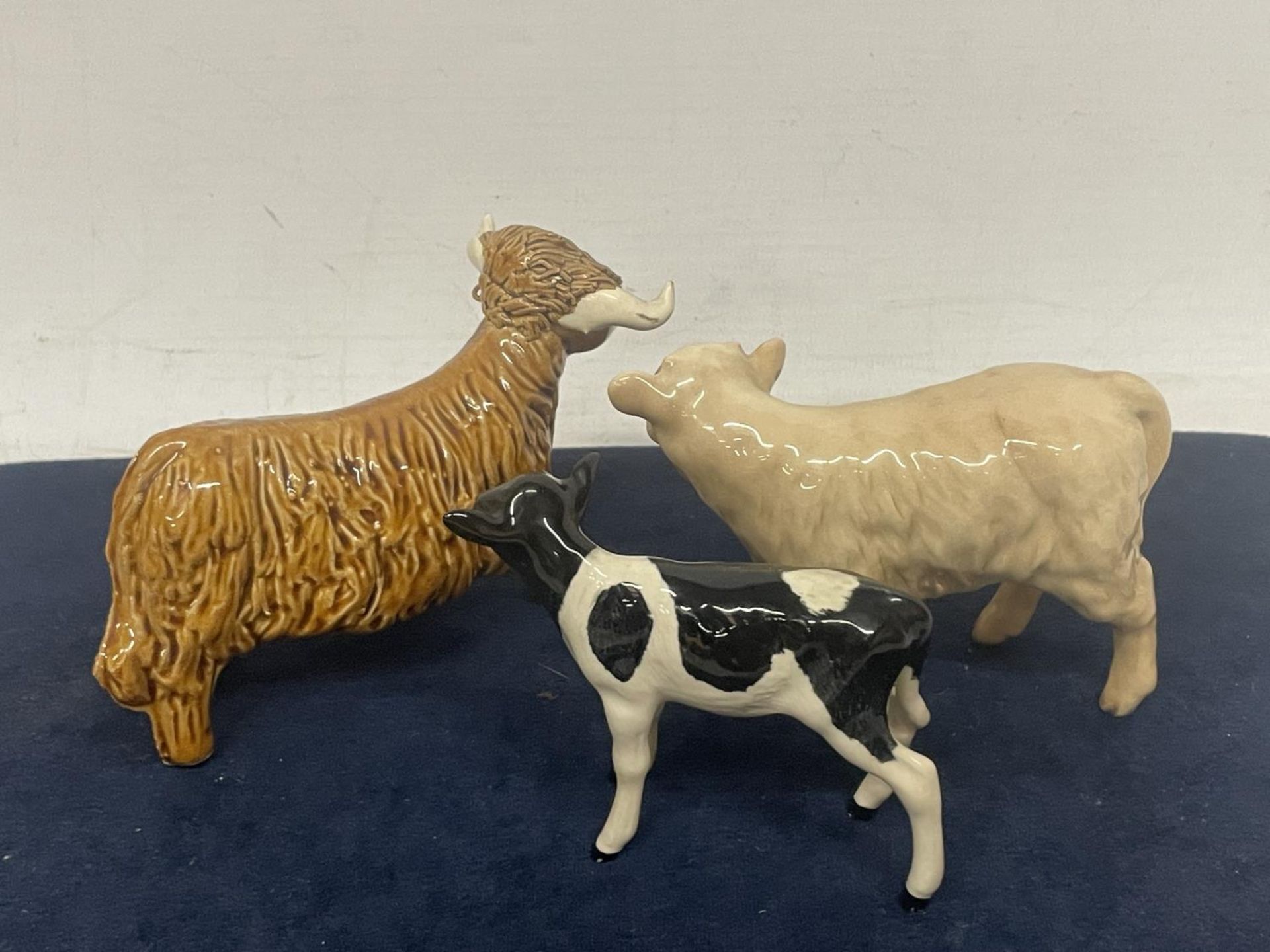 THREE CALVES TO INCLUDE A BESWICK FRESIAN, A BESWICK CHAROLAIS AND A HIGHLAND - Image 2 of 4