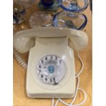 A VINTAGE CREAM DIAL UP TELEPHONE