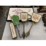 A GROUP OF EMBROIDERED DRESSING TABLE ITEMS AND TILE DESIGN TRAY