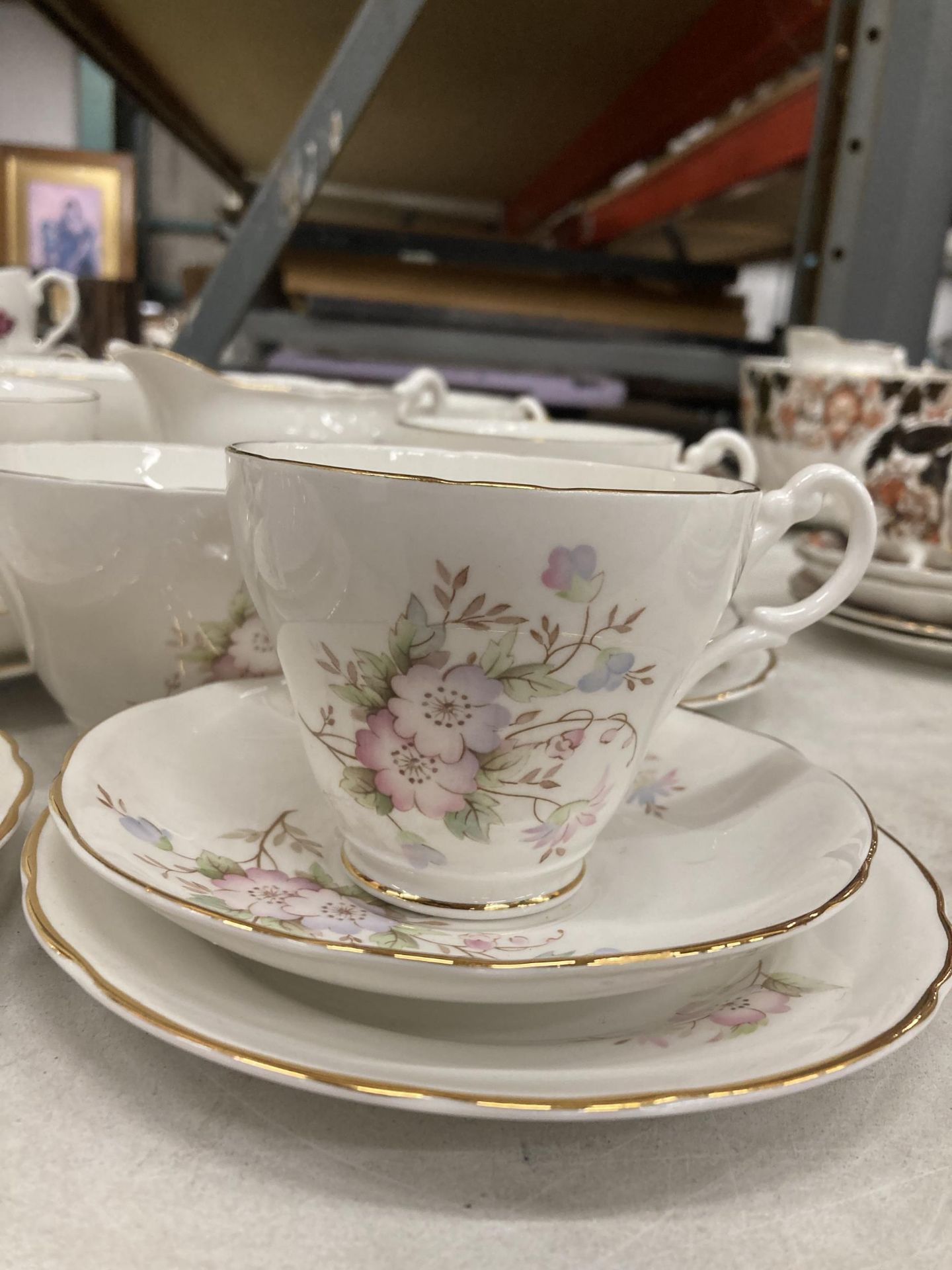 TWO PART CHINA TEASETS, MONTFORT AND RICHMOND, TO INCLUDE A CAKE PLATE, PLATES, CUPS, SAUCERS, - Image 2 of 4
