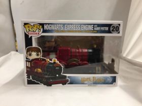 A 'POP' RIDES HOGARTS EXPRESS ENGINE WITH HARRY POTTER - AS NEW IN BOX