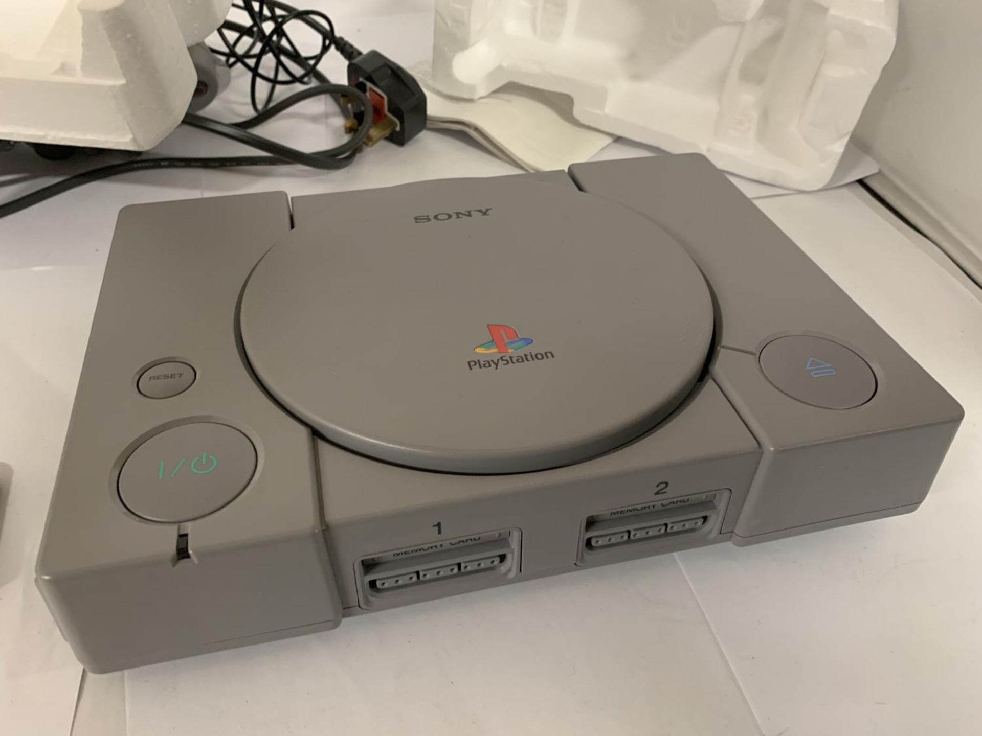 A BOXED PLAYSTATION ONE TOGETHER WITH DUAL SHOCK CONTROLLER - Image 4 of 4
