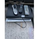 A TECHNIKA DVD PLAYER AND A SKY BOX