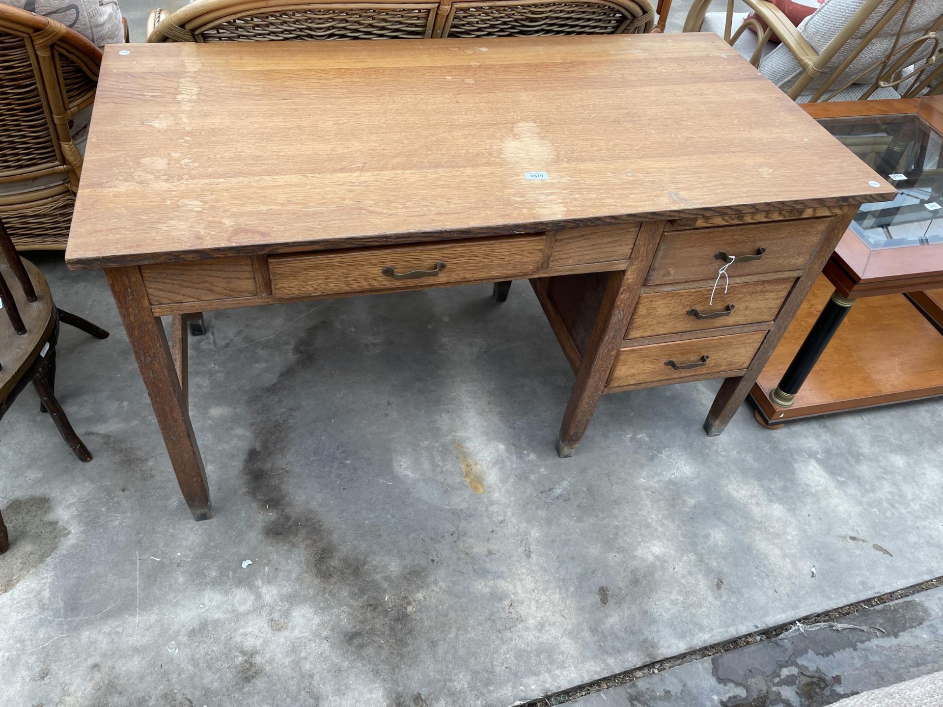 A MID 20TH CENTURY OAK SINGLE PEDESTAL WRITING DESK WITH IMPRESSED MARK 'CADBURY 1930', 54 X 27",