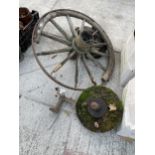 A VINTAGE CART WHEEL, A VINTAGE GRIND STONE AND A COBBLERS LAST ETC