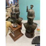A GROUP OF POLICEMAN STATUE BUSTS