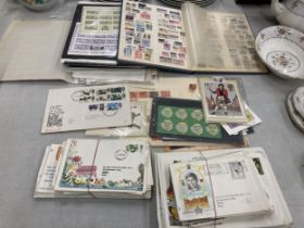A COLLECTION OF VINTAGE STAMPS AND FIRST DAY COVERS