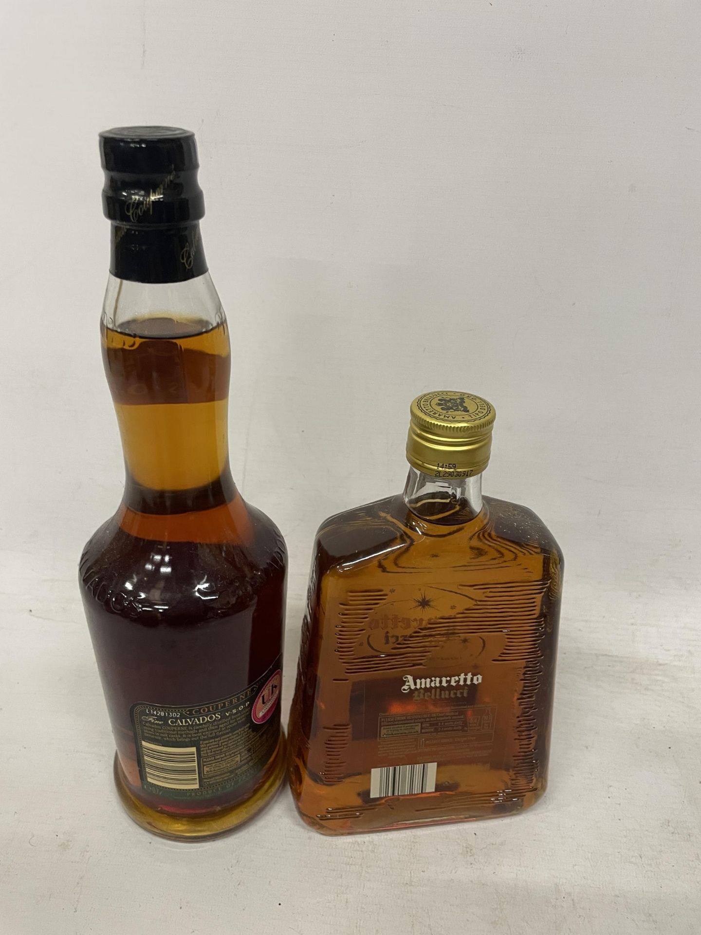 TWO BOTTLES - 70CL AMARETTI BELLUCCI AND 70CL CALVADOS V.S.O.P COUPERNE - Image 2 of 2