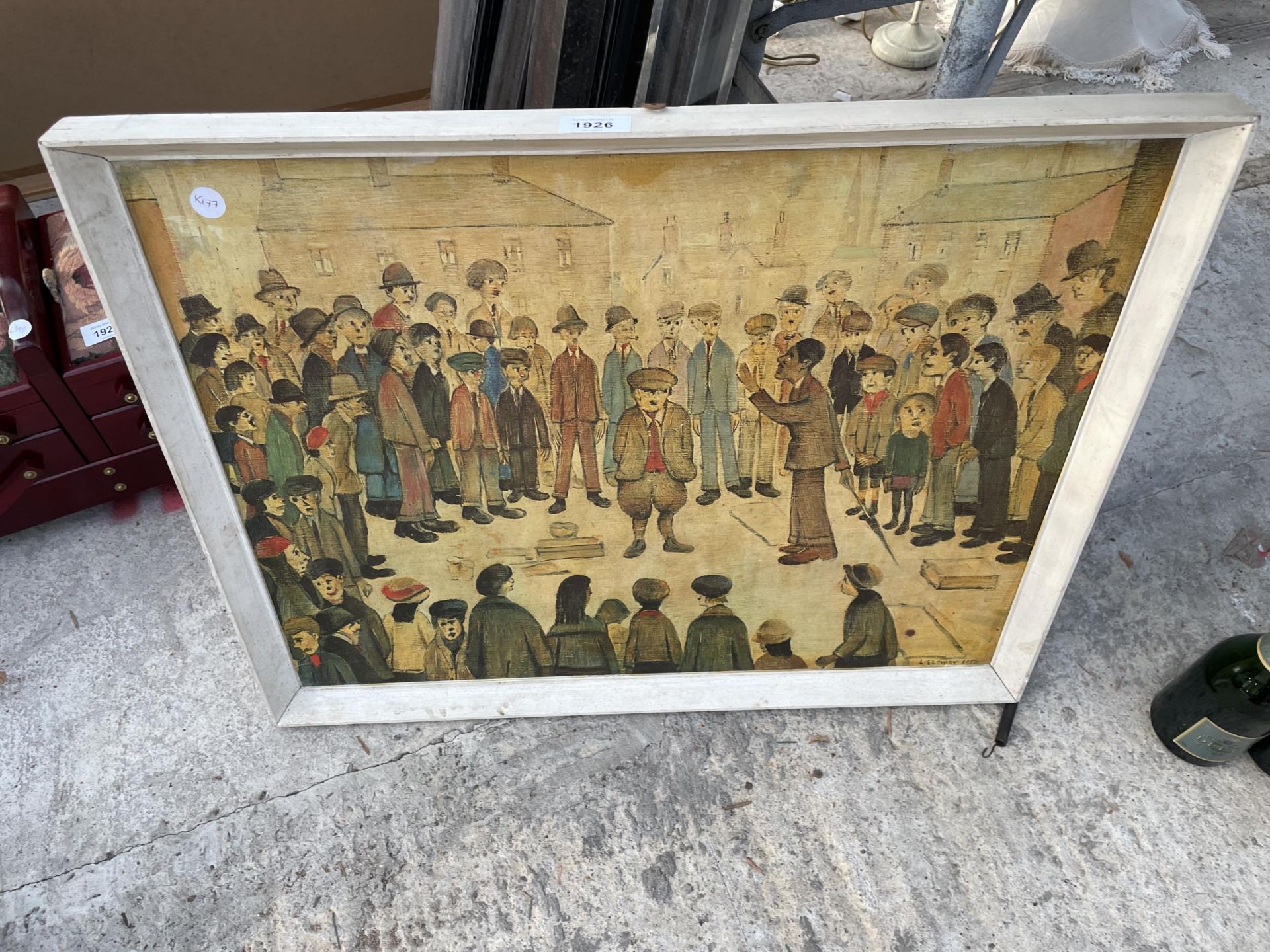 A FRAMED LOWRY PRINT MARKED PUTTNEY 377
