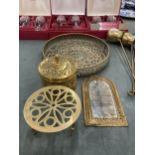 A GROUP OF FOUR BRASS WARES - PIERCED DECORATIVE BOWL, MIDDLE EASTERN ARCHED MIRROR, TRIVET ETC