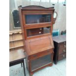 AN EDWARDIAN GLOBE WERNICKE STYLE BUREAU BOOKCASE WITH FITTED INTERIOR, SINGLE DRAWER, TWO SMALL AND