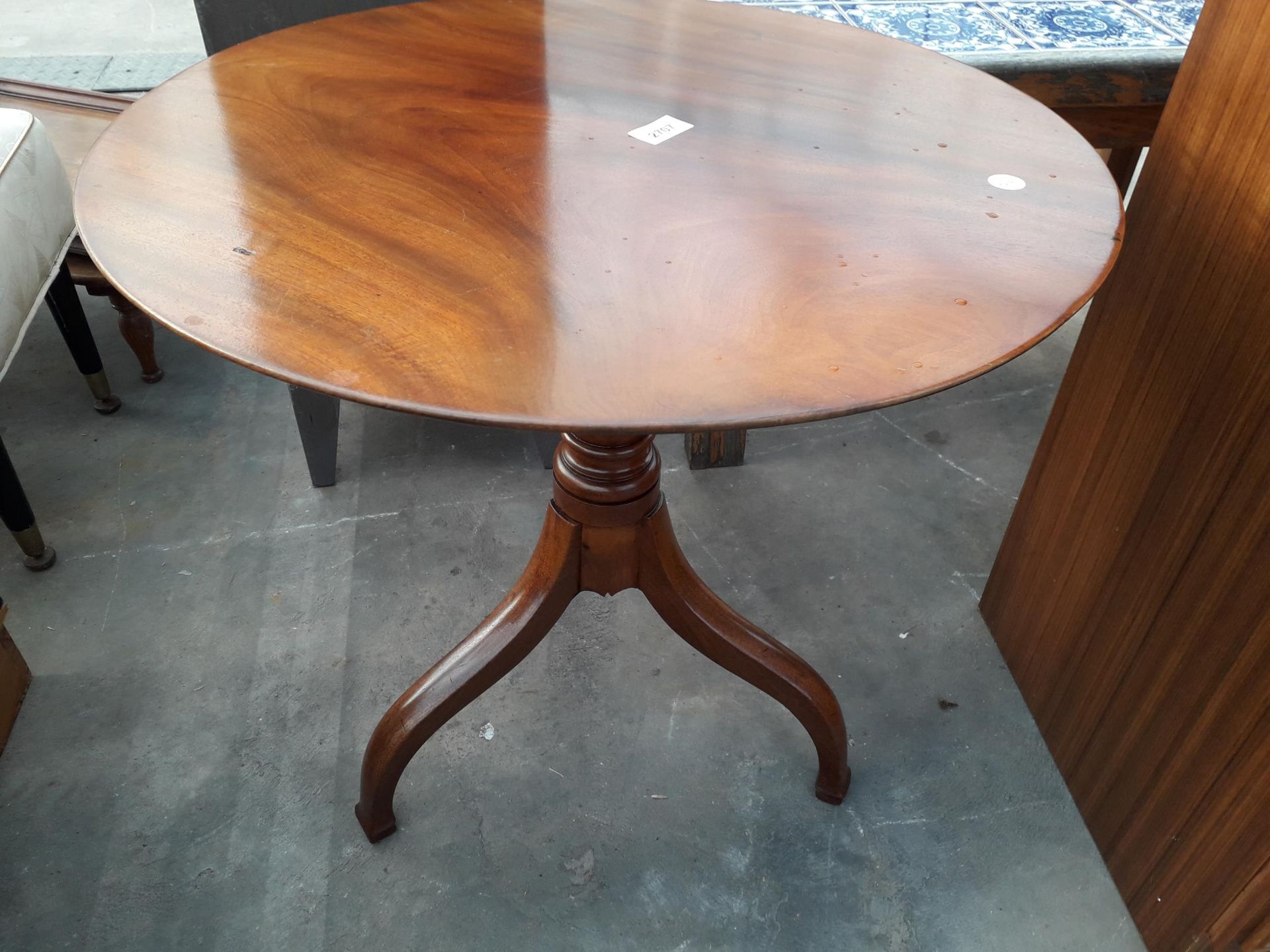 A 19TH CENTURY STYLE MAHOGANY TRIPOD TABLE, 23" DIAMETER