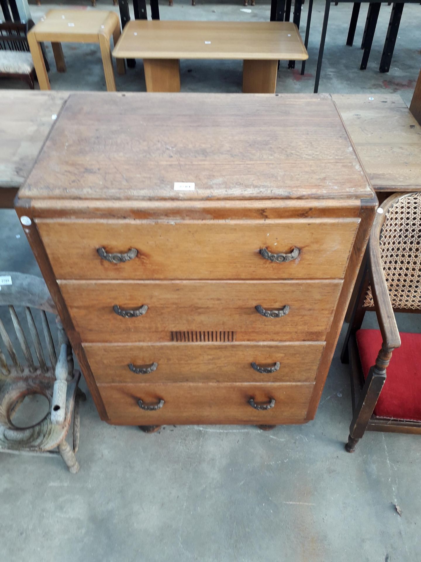 A MID 20TH CENTURY OAK CHEST OF FOUR DRAWERS, 27" WIDE