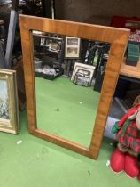 A VINTAGE WOODEN WALL MIRROR, 60CM X 90CM