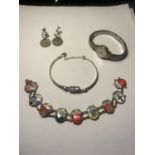 FOUR ITEMS TO INCLUDE A 925 BRACELET, MARKED 810 SHEILD BRACELET, A PAIR OF 50% SILVER COIN EARRINGS