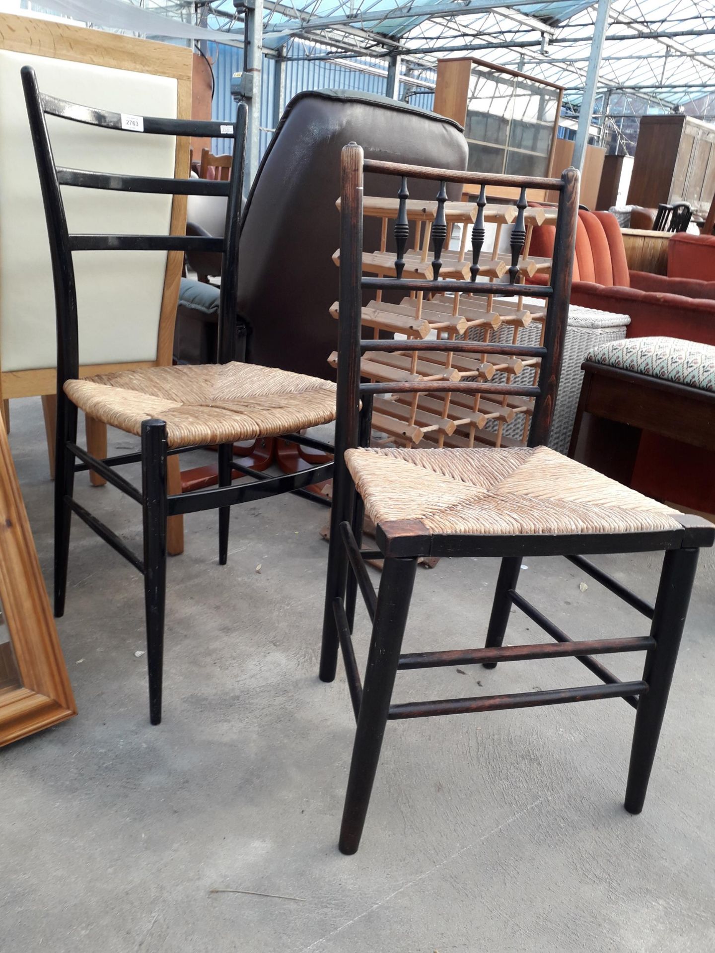 TWO ELM AND BLACK PAINTED SUSSEX TYPE CHAIRS WITH RUSH SEATS - Image 2 of 2