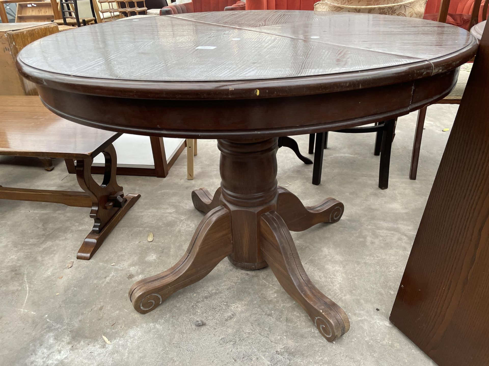 AN OAK 42" DIAMETER PEDESTAL DINING TABLE (LEAF 18") - Image 2 of 3