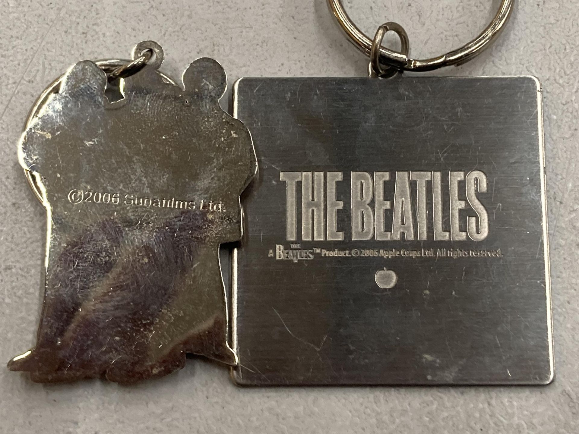 TWO BEATLES KEYRINGS, DATED 2006 - Image 2 of 2