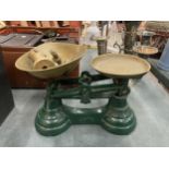 A SET OF SMALL VINTAGE LIBRASCO SCALES WITH BRASS PANS AND WEIGHTS