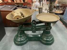 A SET OF SMALL VINTAGE LIBRASCO SCALES WITH BRASS PANS AND WEIGHTS