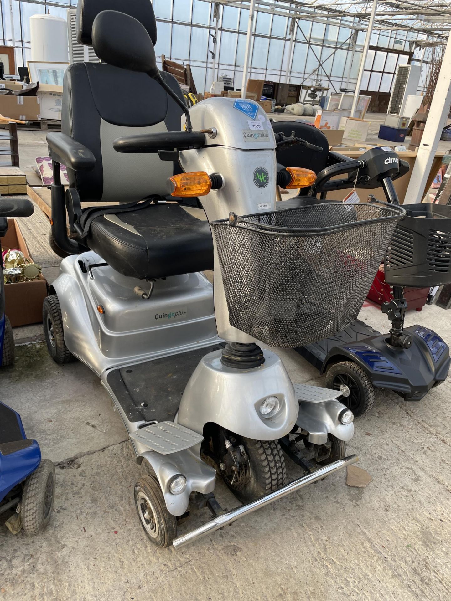 A QUINGO PLUS MOBILITY SCOOTER COMPLETE WITH KEY AND CHARGER AND BELIEVED IN WORKING ORDER BUT NO